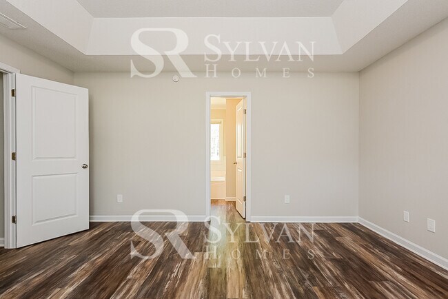 Building Photo - The living is easy in this 3 bedroom, 2 bathroom home