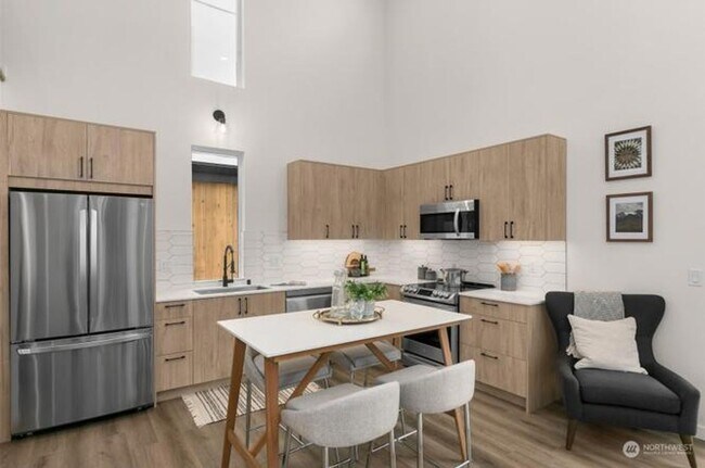 Building Photo - Welcome Home -Modern and Expansive Windows