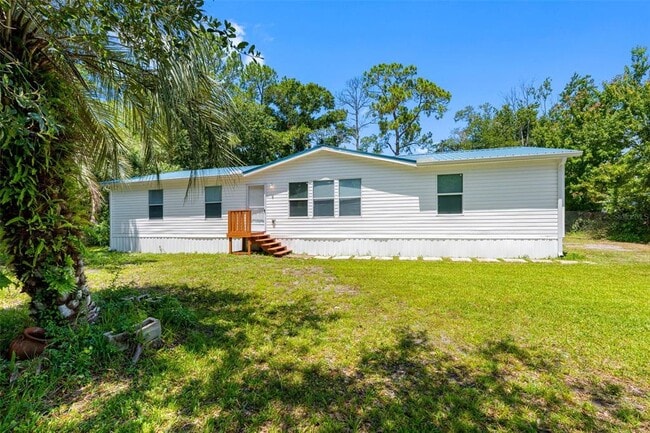 Building Photo - 6847 Woodsman Dr