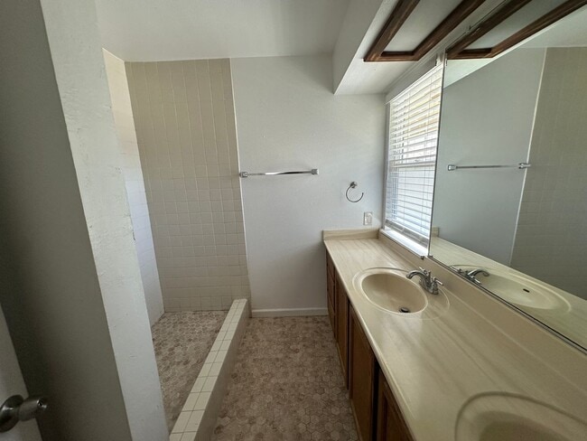 Building Photo - Your Dream Home: Spacious Interiors, Garage, and Huge Backyard