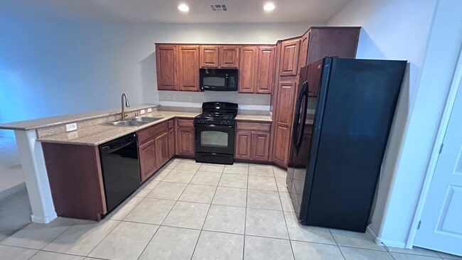 Building Photo - Freshly Painted 3 Bedrooms Home in Gated M...