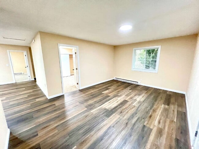 Building Photo - Elevated 3-Bedroom Home with Secure Garage & Cozy Living Space