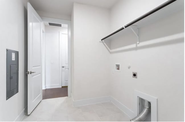 Laundry with view to 1/2 Bath - 8204 Skytex St