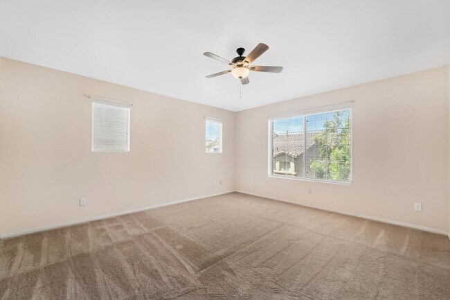 Building Photo - Gated Living with Community Pool & Thoughtfully Designed Open Layout!