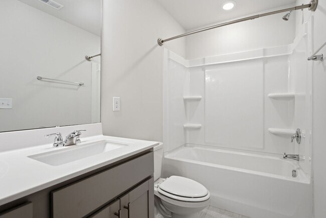 Building Photo - Upgraded 3BR Townhome in Wake Forest | Open Layout, Garage & Resort-Style Amenities