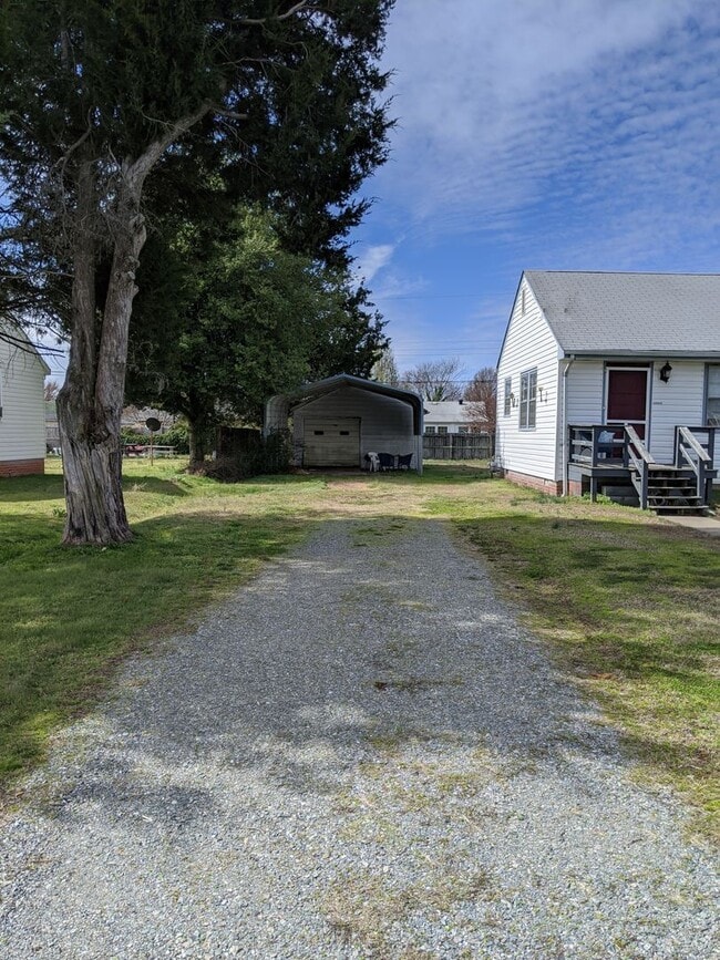 Building Photo - Three bedroom / one bath  with Garage and Carport