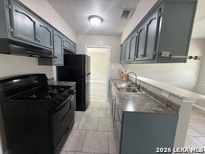 Building Photo - 4911 Tennyson Dr