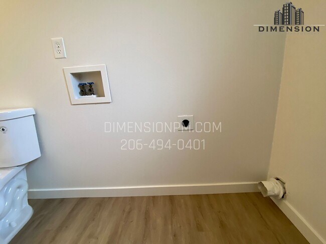 Building Photo - Stylishly Renovated Home with Private Back...