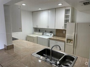 Building Photo - 3 bedroom 1.5 bath townhome. Private fence...