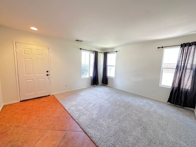 Building Photo - 4 bedroom home. New Carpet!