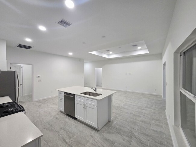 Building Photo - BRAND NEW 4/2/2-SOUTH LEHIGH ACRES