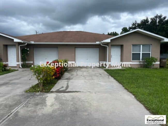 Primary Photo - 2x2 Duplex with Garage! Available Now! Own...