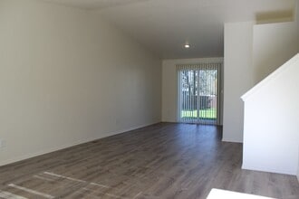 Building Photo - 4 BR, 2 1/2 BA home with fenced yard.