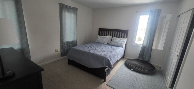 Building Photo - No Fee,  Nearly 3k Sq. ft Pet-Friendly Townhouse near Boston Landing with 2 Parking Spots Included!