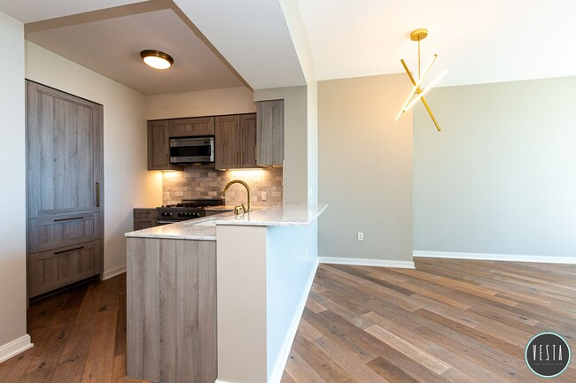 Building Photo - ELEGANT CITY 1BD/1BA RETREAT WITH SKYLINE ...