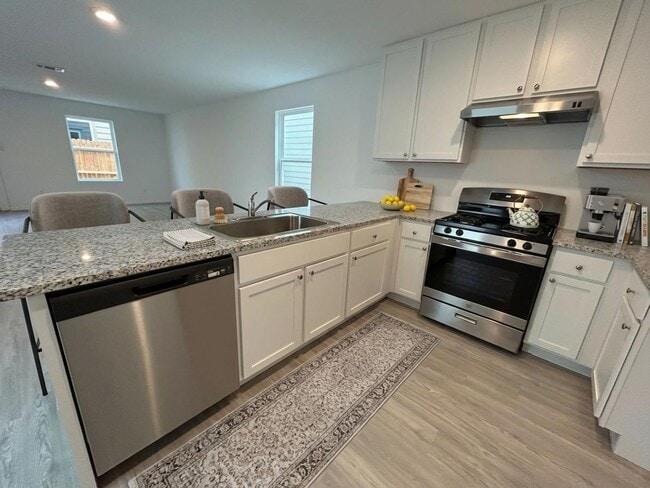 Building Photo - Rare Find: Affordable 3BR Ready for Immediate Move-In- Apartment-Style Living Without The Apartment!