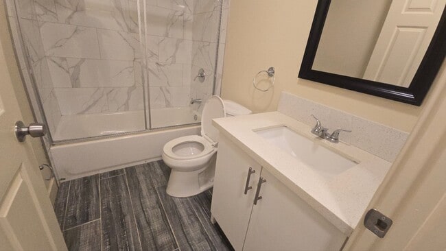 Building Photo - All Bed& Bath at 1st ,2 car Assigned Parking Space at back with access alley,tile &laminate floor...