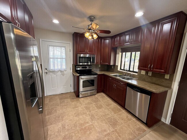 Building Photo - Stunning 2-bedroom, 2-bathroom home with large fenced in back yard.