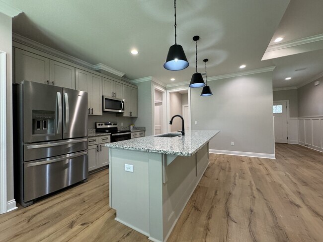 Building Photo - "Charming 4 Bed, 2 Bath Home with Granite ...