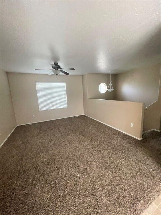 Building Photo - Move-In Ready 5-Bed with Garage, Yard & Up...