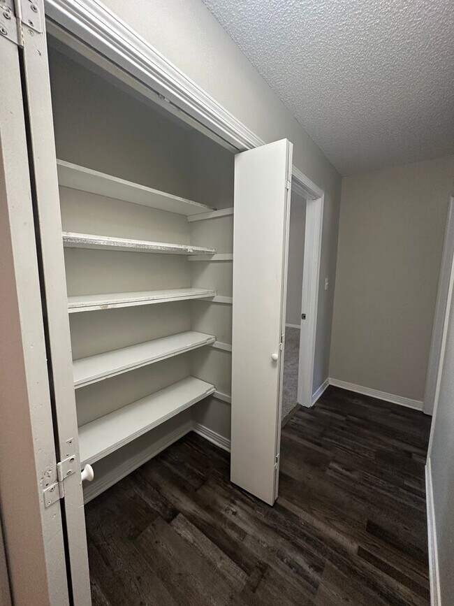 Building Photo - Charming Corner Haven 4BR/3BA Brick Home for Rent