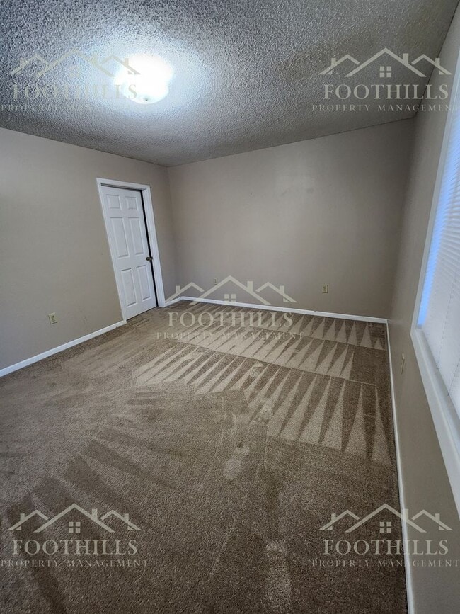 Building Photo - Bright 2-Bed, 2-Bath Condo Near Darwin Wri...