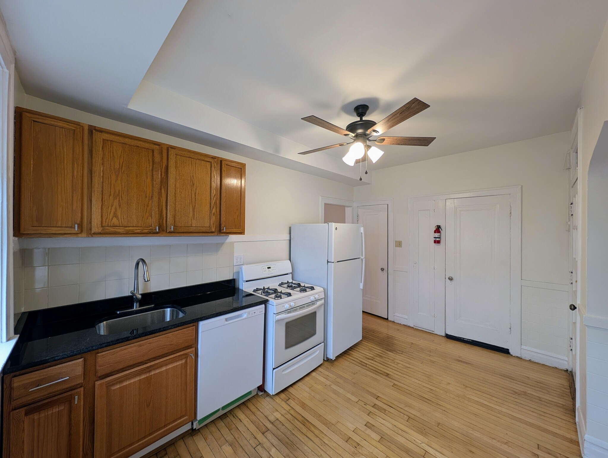 Kitchen with new dishwasher and new granite countertop - 3508 W Dickens Ave