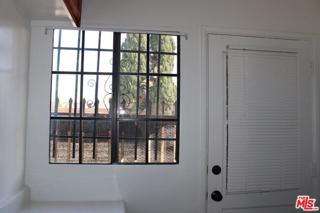 Building Photo - 6340 10th Ave