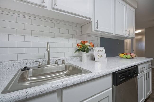 Novela Apartments Kitchen sink and subway tile - Novela