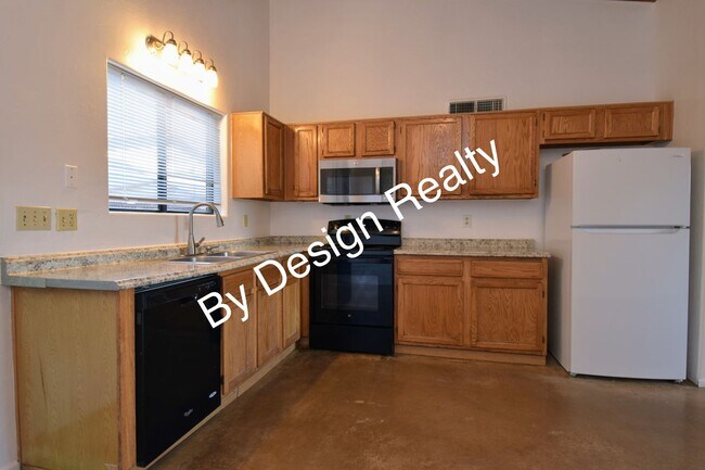 Building Photo - Charming Mid-Century Style: Vaulted Beams & Private Oversized Yard