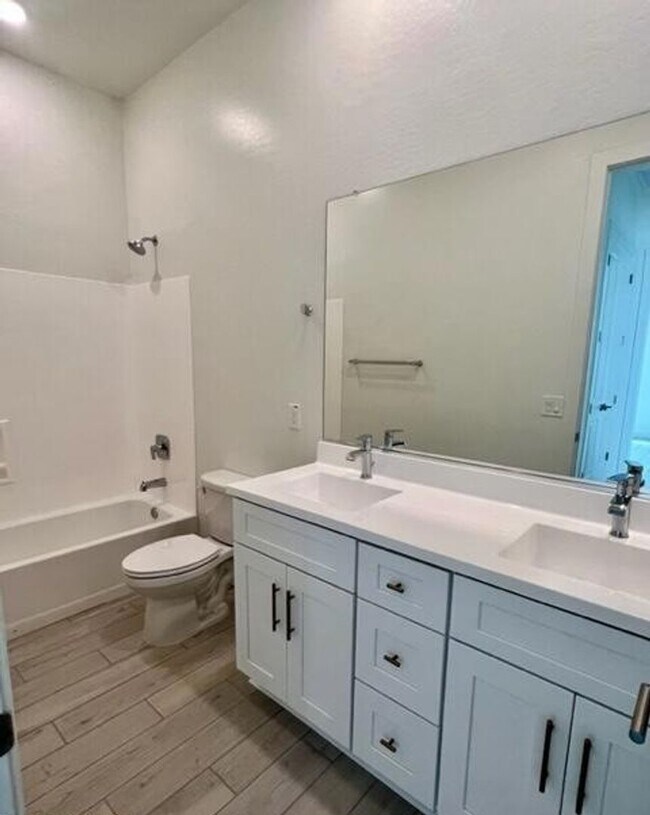 Building Photo - Executive Single-Story 4-Bedroom Rental with $50K+ Upgrades & Indoor-Outdoor Living in Chandler, AZ