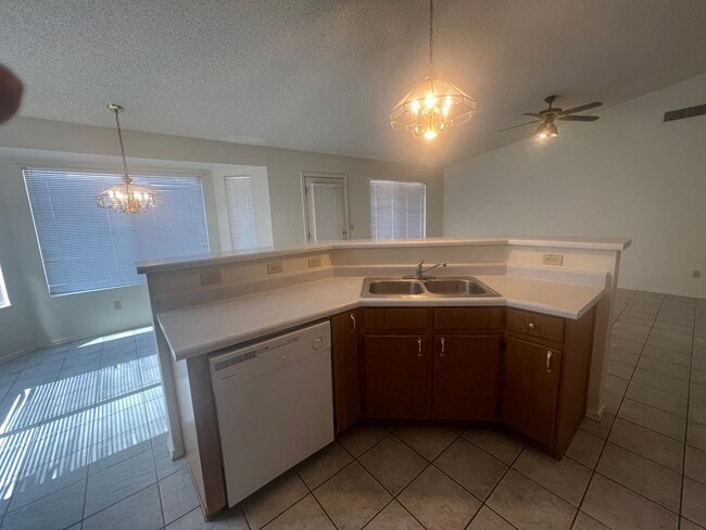 Building Photo - NICE 3 BEDROOM IN RITA RANCH WITH GREAT FL...