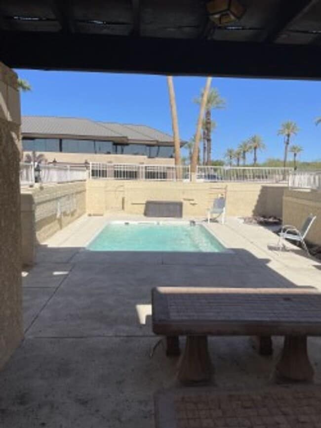 Building Photo - Spacious 3 bedroom, 3 bath, condo with a l...