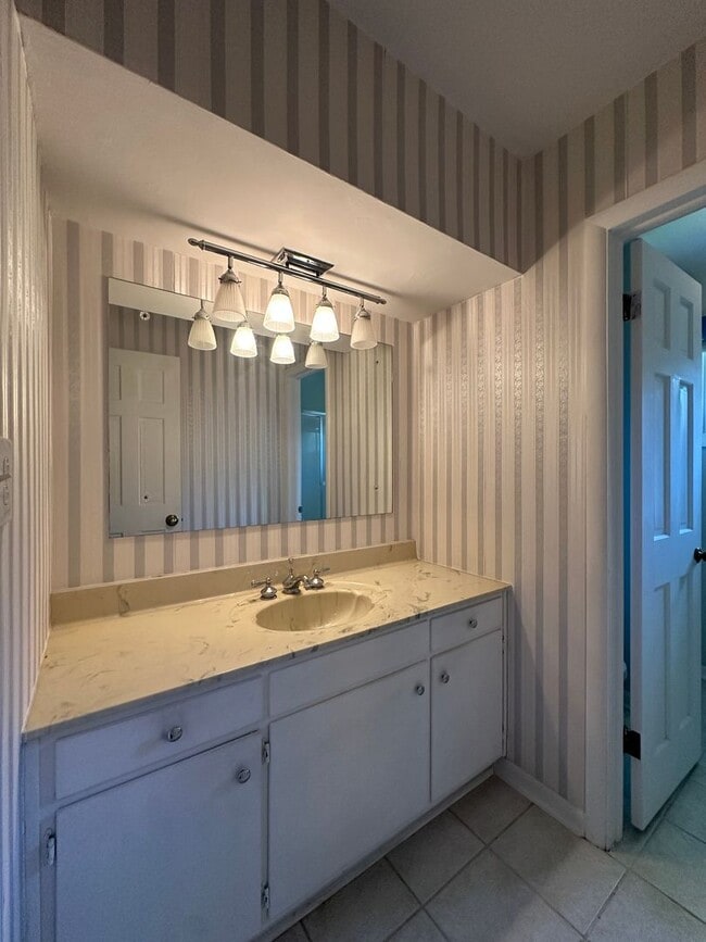 Building Photo - Not Your Typical Rental — Warm, Welcoming 3BR Brick Ranch in a Prime Neighborhood