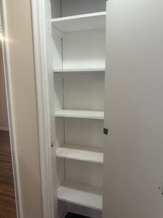 Building Photo - Step into this beautifully updated 1950's gem, where charm meets modern convenience