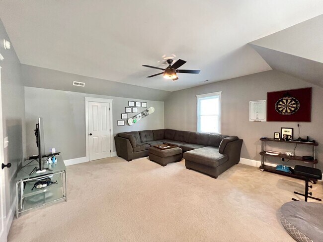 Building Photo - Gorgeous Custom Built 4BD, 3BA Holly Springs Home with Home Gym Setup and Fenced In Yard