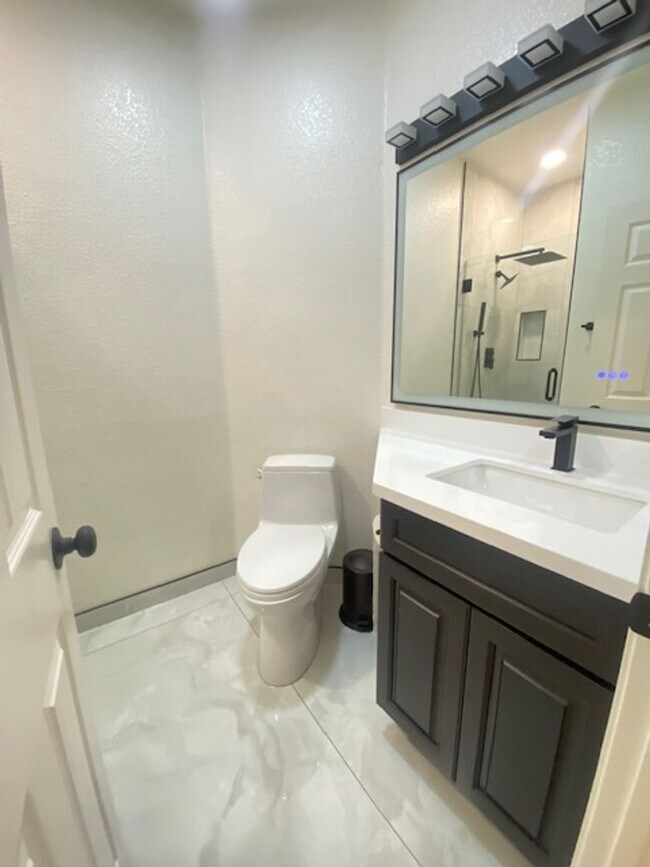 Building Photo - Spacious 5-Bedroom Home with Solar, Stunning Sunroom & Upgraded Bathrooms!