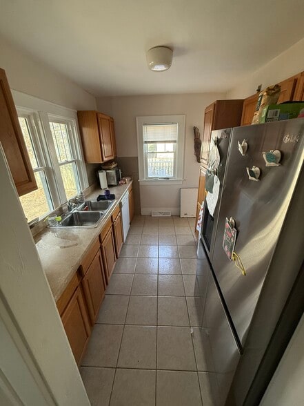 Kitchen will include new Granite countertops and tile backsplash - 2827 Wood St