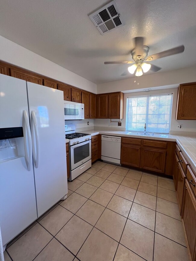 Building Photo - TWO BEDROOM CONDO WITH TWO CAR GARAGE IN H...