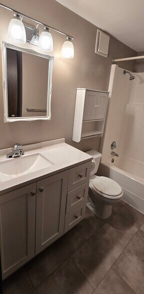 Bathroom with linen closet. - 27035 Oakmead Dr