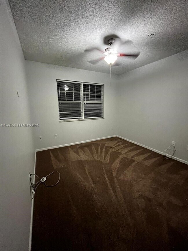 Building Photo - 5900 W Sample Rd