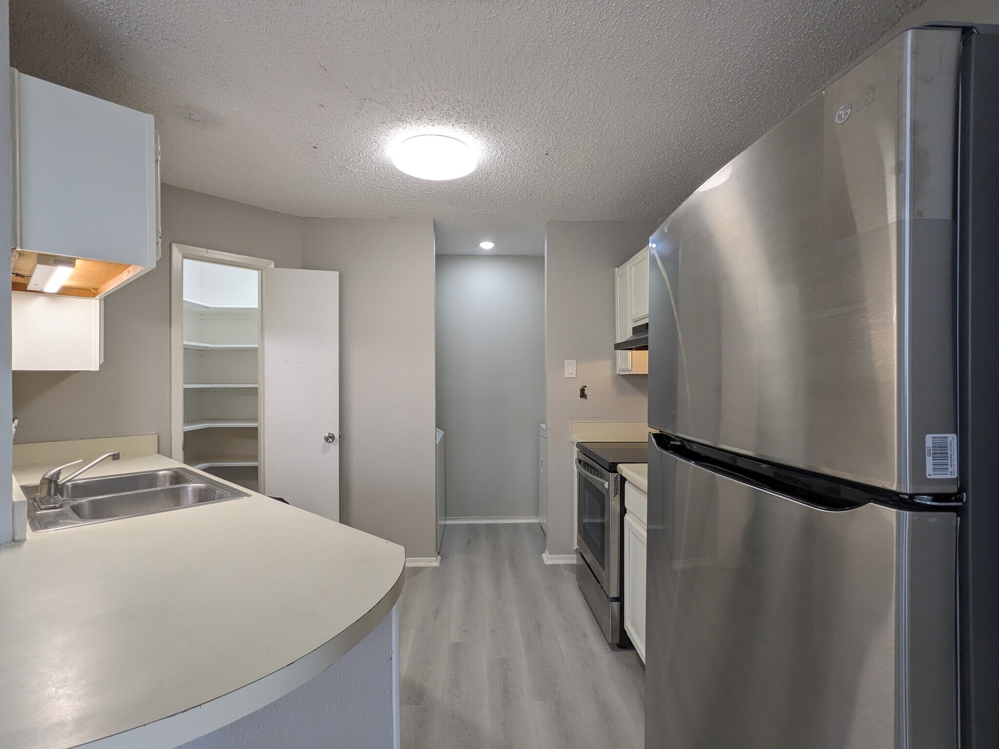 Kitchen and Laundry Area - 2522 Corian Glen Dr