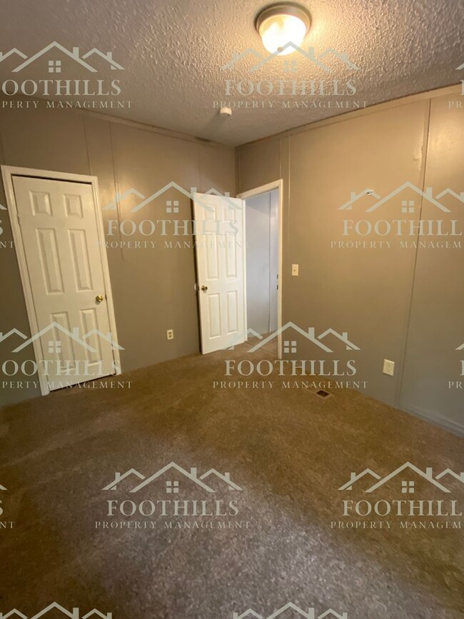 Building Photo - Spacious 4-Bedroom Double-Wide Mobile Home...