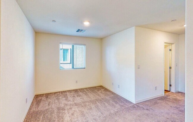 Building Photo - Cozy 2-story, 3BR 2BA townhome in a new community in North Las Vegas.