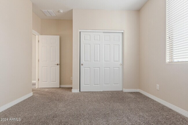 Building Photo - 21366 W Almeria Rd