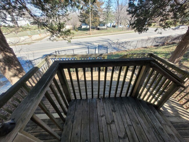 Building Photo - Four bedroom home on Indianola Ave with large yard and two decks!