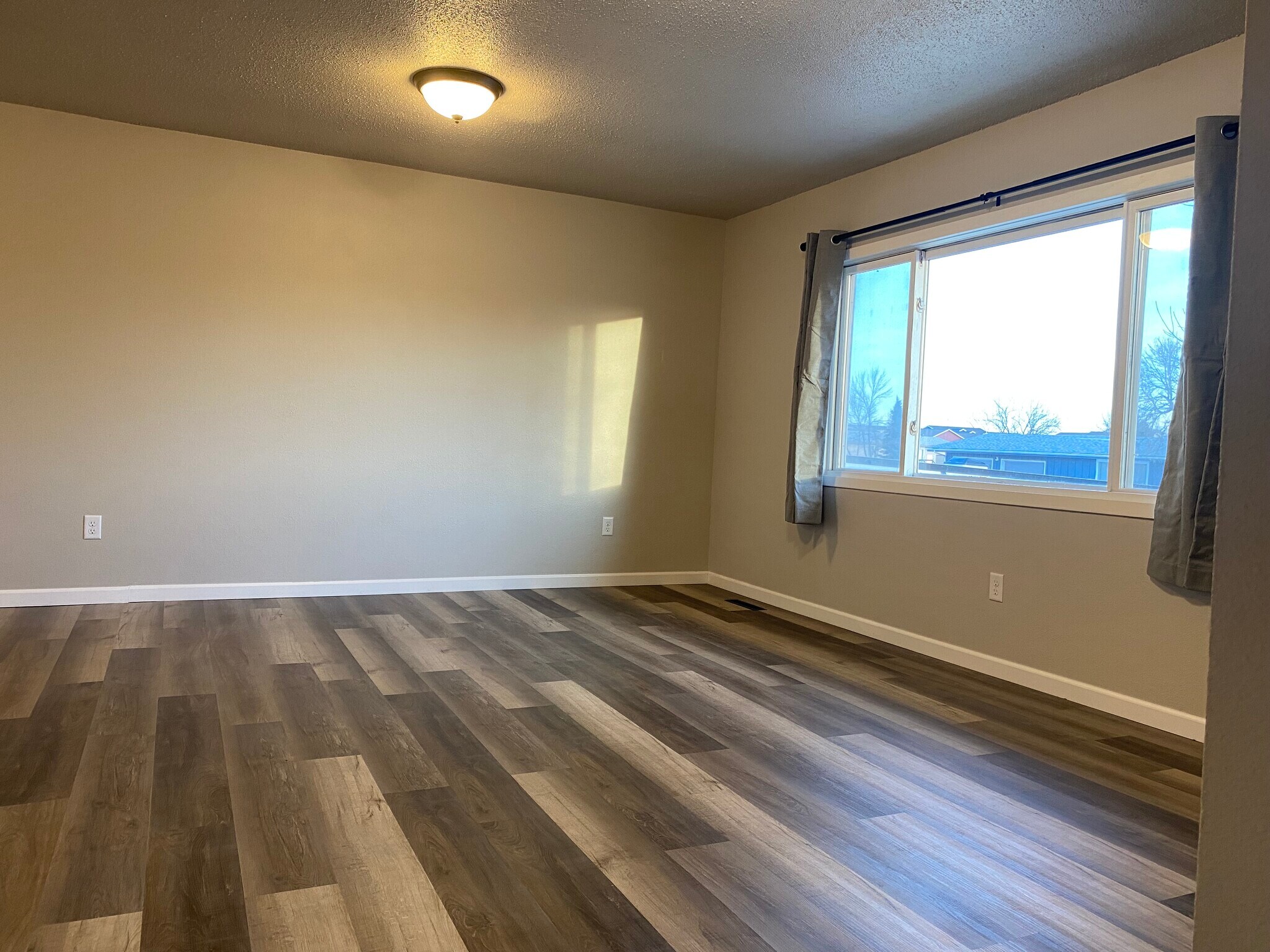 New flooring through the entire upstairs. - 225 6th St SE