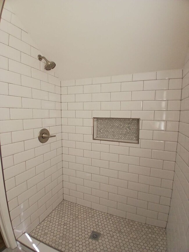 Building Photo - Stunning Renovation with Classic Character and Modern Upgrades