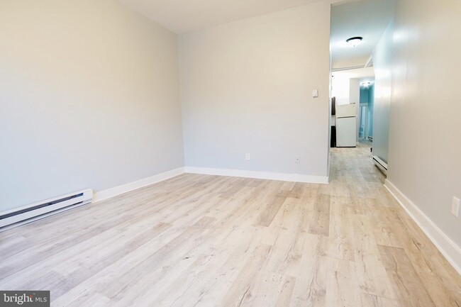 Building Photo - 7022 Woodland Ave