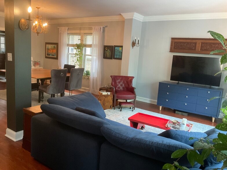 The living room is open to the dining room - 825 Forest Ave